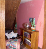 Lower level of front addition - reading nook right view under the stairs