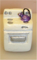 Stove with purple Tea Kettle