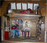 Notice the dragon chair that the Wizard is sitting in.