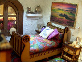 There's a clock on the other bedside table but you can only see the very top of it.