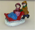 Boy & Girl on Sled