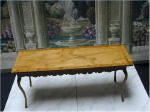 Queen Ann cherry wood table with lace wood edges. 