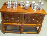 Buffet with beer pitcher and beer steins ready for guests of the Game room.