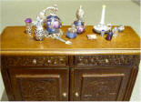 Dressing table in the corner with scissors and actual comb style from Tudor era. 